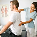 physiotherapist assessing posture at home Sydney